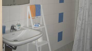 Hair dryer, towels, toilet paper