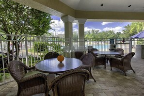 Outdoor dining - 3BR Orangebaum Condo w/Private Balcony, Pool & Resort Access Near Disney (Kissimmee)