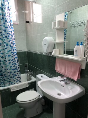 Shower, rainfall showerhead, towels
