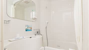 Combined shower/tub, free toiletries, hair dryer, slippers