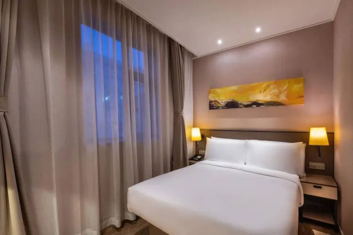 Desk, blackout drapes, WiFi (free), bed sheets