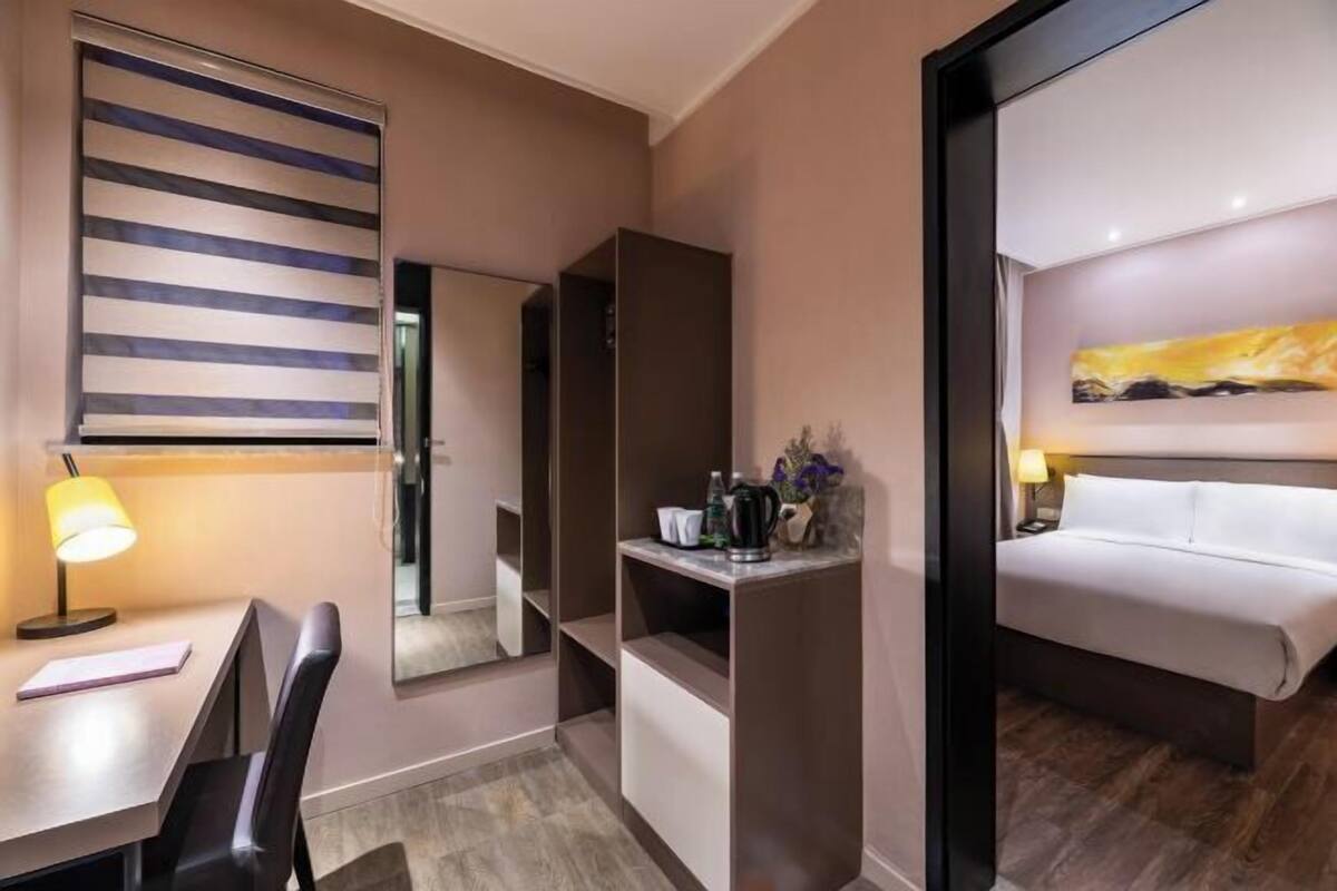 Desk, blackout curtains, free WiFi, bed sheets