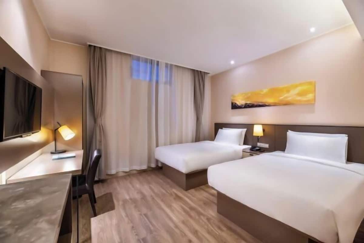 Desk, blackout curtains, free WiFi, bed sheets