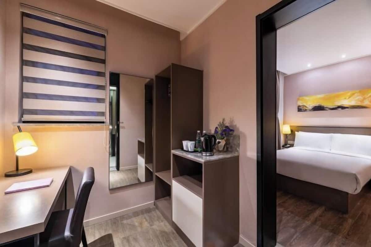 Desk, blackout curtains, free WiFi, bed sheets