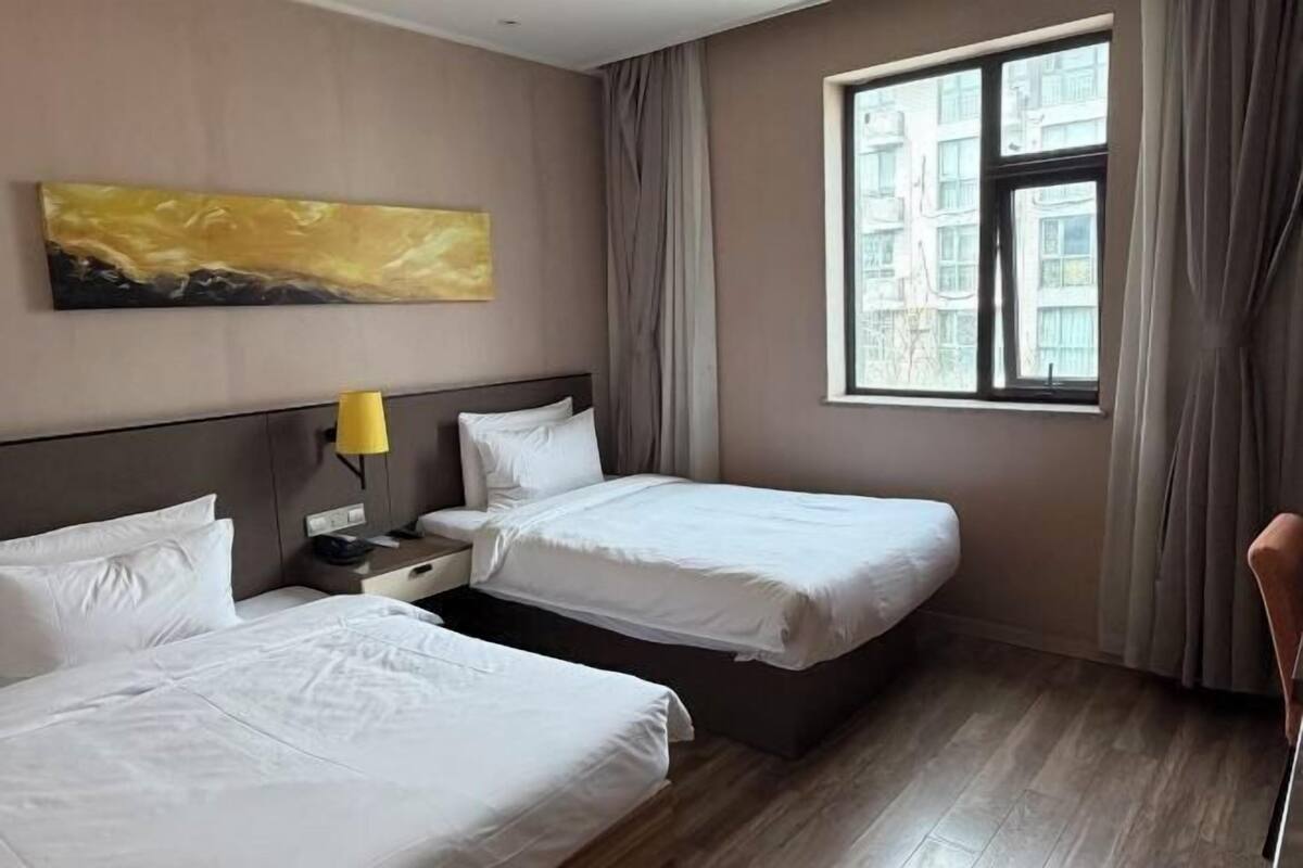 Desk, blackout drapes, WiFi (free), bed sheets