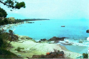 On the beach, sun-loungers, beach towels