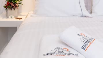 Classic Room | Premium bedding, down comforters, memory foam beds, soundproofing