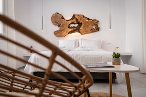 Habitación Deluxe | Ropa de cama de alta calidad y edredones de plumas