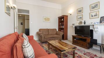 Comfort Room (1 Bedroom) | 1 bedroom, laptop workspace, iron/ironing board, WiFi