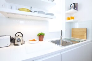 Apartamento (2 Bedrooms) | Cozinha privada | Geladeira, fogão, lava-louças, chaleira elétrica