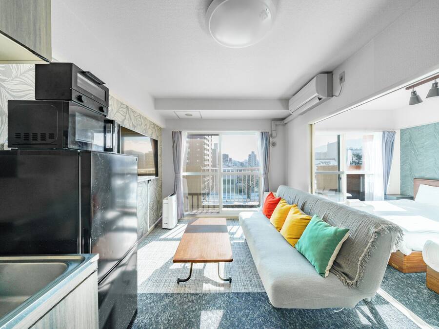 Family Apartment, Non Smoking (601) | Living area | 32-inch flat-screen TV with digital channels, TV