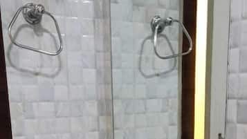 Shower, free toiletries, slippers, towels