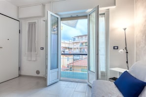 Appartement, 1 chambre | Aire de séjour | Téléviseur à écran plat