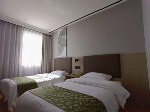 A hotel room with two beds, a large window with curtains, a wall-mounted phone, and a painting. - Greentree Inn Shanghai Car Piers Studio Beisong Ro (Shanghai)