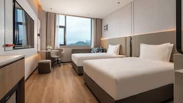 Premium bedding, down duvets, desk, blackout curtains