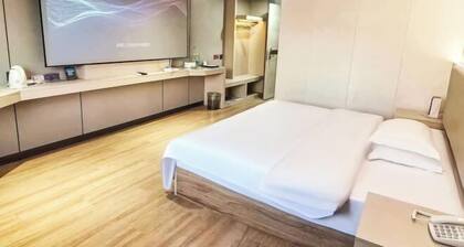 Pai Hotel (Hezhou Lingfeng Plaza)