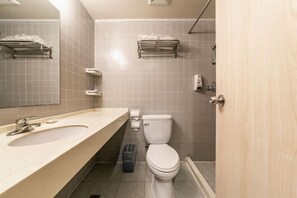 A modern bathroom with a sink, toilet, and shower. - Jinjiang Inn (Wuxi New District National Software Park) (Wuxi)
