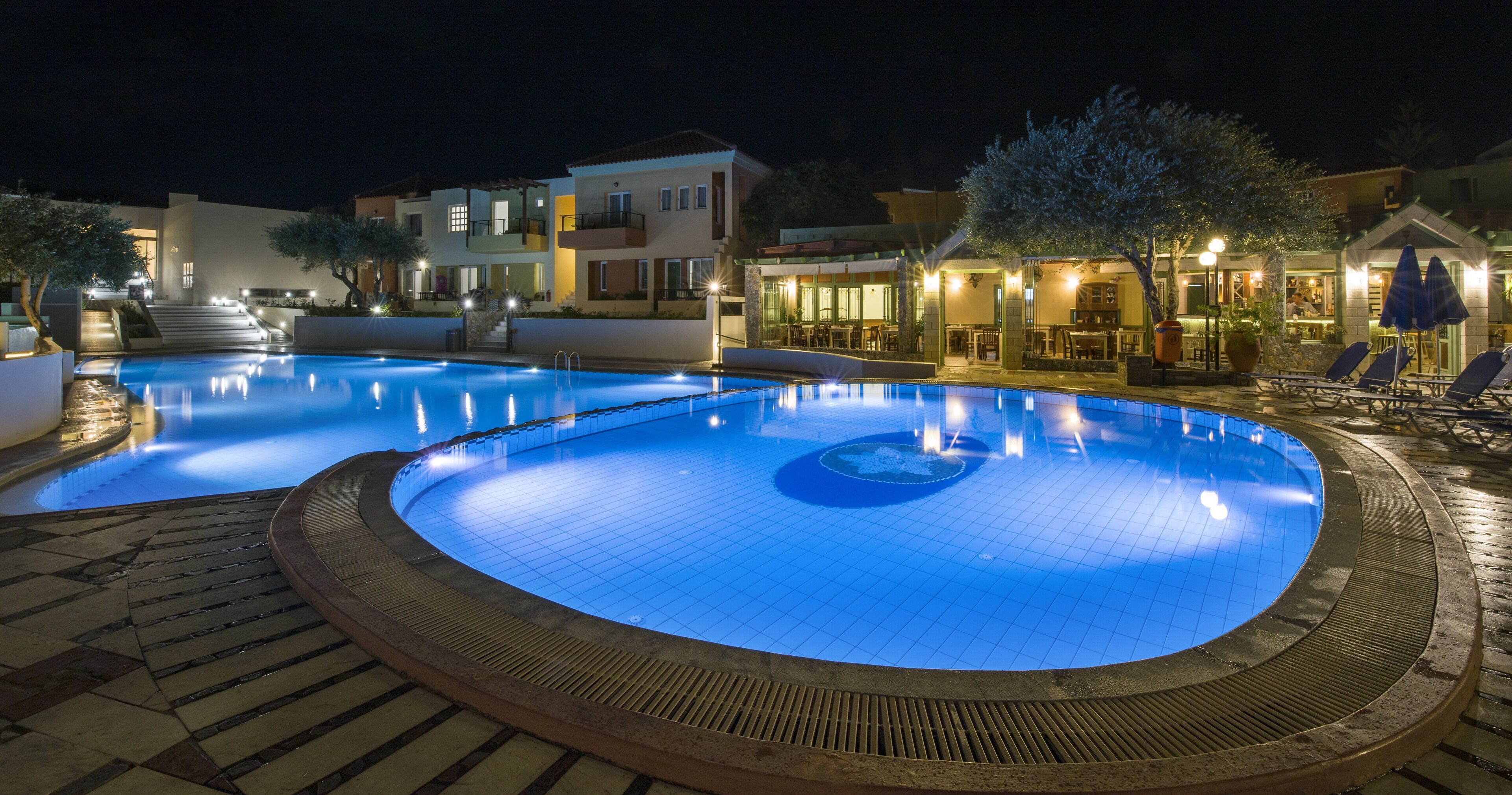 Seasonal outdoor pool, pool umbrellas, pool loungers