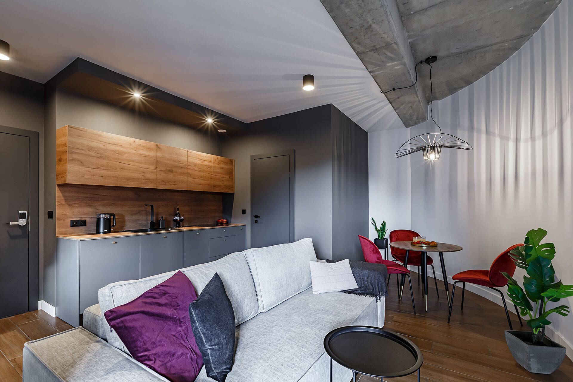 Deluxe-Studiosuite (1) | Wohnbereich | Flachbildfernseher