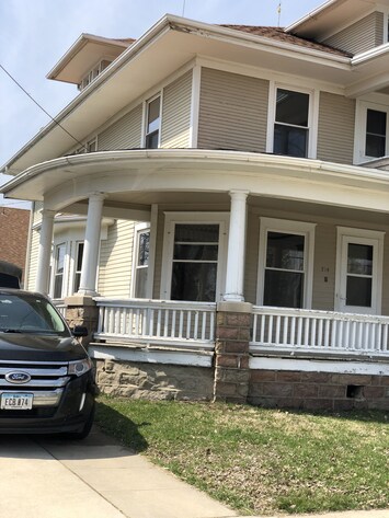 Exterior of home with wraparound porch 