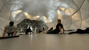 A geodesic dome structure with a reflective interior and a view of trees outside. - When heritage, art and well-being meet (CANDES SAINT MARTIN)
