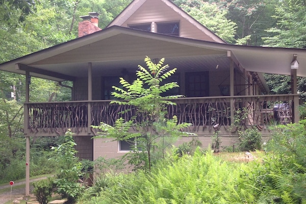 Side of home showing all three levels
