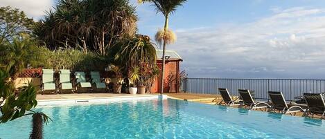 Outdoor pool, open 8:00 AM to 9:00 PM, pool umbrellas, sun loungers