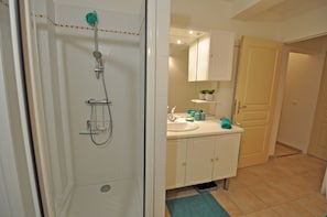 Shower, hair dryer, towels, soap