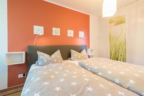 2 bedrooms, travel crib, WiFi, bed sheets