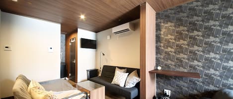 Appartement, 1 chambre | Coin séjour | Télévision