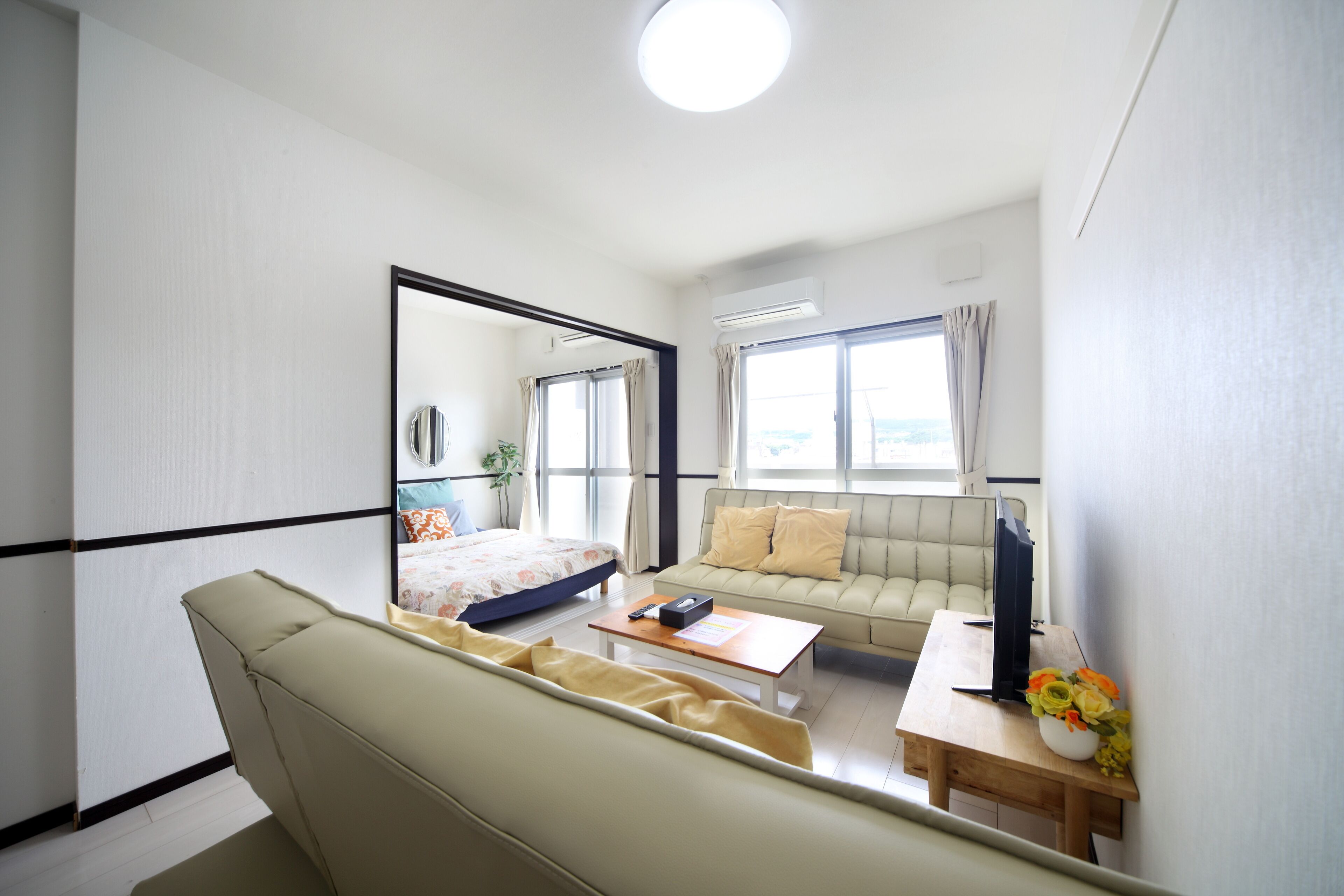 Apartamento, 1 habitación | Zona de estar | Una televisión