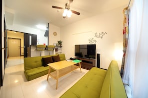 Apartment, 1 Bedroom | Living area | TV