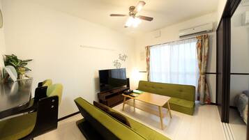 Apartment, 1 Bedroom | Living area | TV