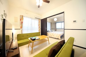 Apartment, 1 Bedroom | Living room | TV