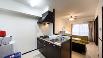 Apartment, 1 Bedroom | Private kitchen | Fridge, microwave, stovetop, electric kettle