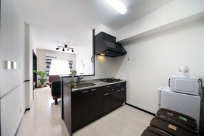Apartment, 1 Bedroom | Private kitchenette | Fridge, microwave, stovetop, electric kettle - T.Trust202 (Itoman)