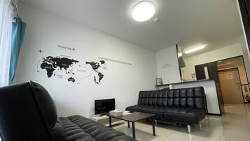 Apartment, 1 Bedroom | Living area | TV