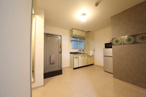 Apartment, 2 Bedrooms | Private kitchenette | Fridge, microwave, stovetop, electric kettle