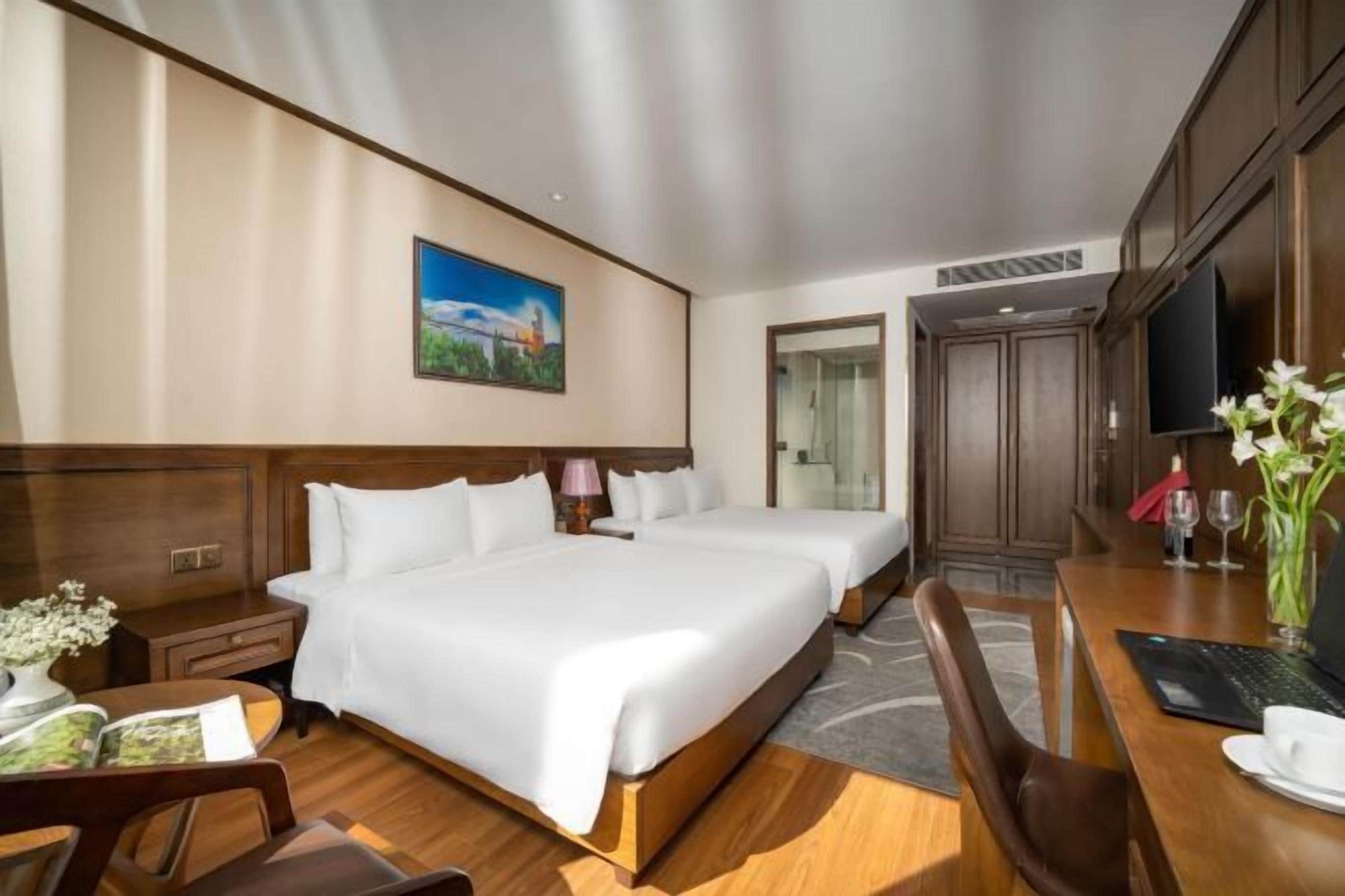 Ropa de cama de alta calidad, colchones con acolchado adicional, minibar