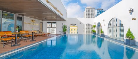 Outdoor pool, open 6:30 AM to 10:00 PM, pool umbrellas, sun loungers
