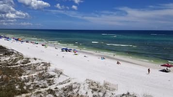 On the beach, sun loungers, beach towels