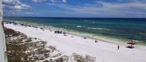 On the beach, sun loungers, beach towels