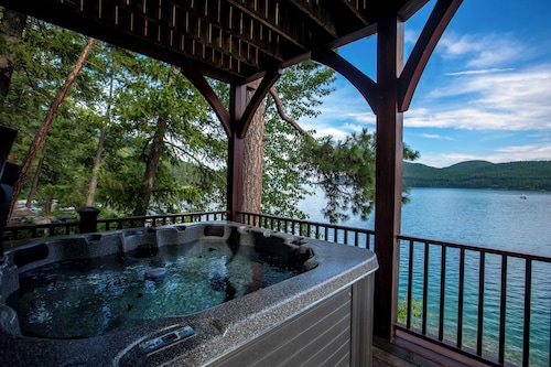 Spectacular Whitefish Lakefront home!! Private dock, paddle boards, kayak and incredible views