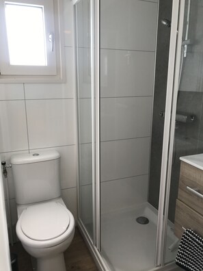 Hair dryer, towels, soap, shampoo