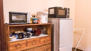 Fridge, microwave, cookware/dishes/utensils