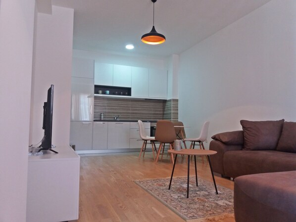 Design Apartment | Living area | Flat-screen TV