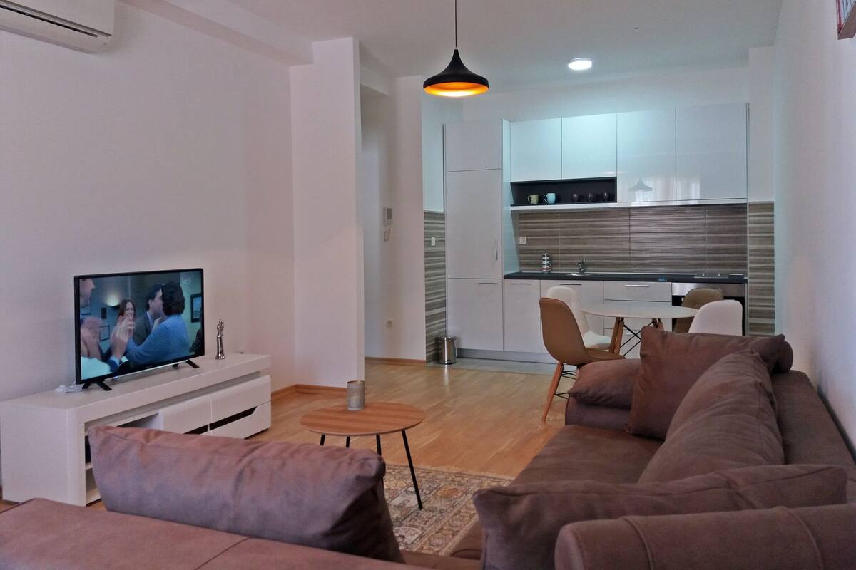 Design Apartment | Living area | Flat-screen TV