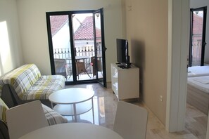 Familjelägenhet | Vardagsrum | Platt-tv