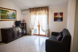 Apartment, 1 Bedroom, Non Smoking | Living area | Flat-screen TV - Comfortable Apartment - Quartu - close to Poetto Beach (Quartu Sant'Elena)