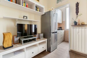 Appartamento, 1 camera da letto, non fumatori | Area soggiorno | TV a schermo piatto